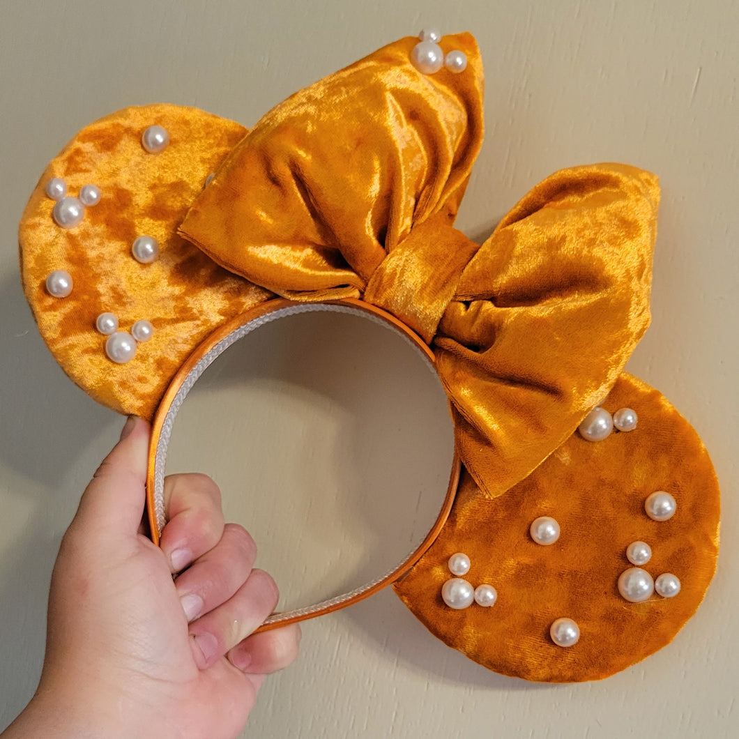 Orange velvet Mickey ears with pearl accents