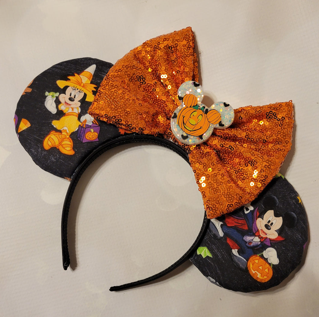Fab 4 in their Halloween costumes Mickey ears headband